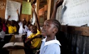 Elizabeth attends St Francis School thanks to a cash transfer provided by Concern to her parents - Nancy Wanjiku (34) and husband Eric Karanja (38) who work on the Dandora dumpsite. Kenya. Photo: Abbie Trayler-Smith/Panos Pictures for Concern Worldwide.