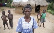 Kazadi wa Mwamba Charlotte, 40, a widow and mother of 7, pictured with four of them at her house in Manono, DRC. She is participating in Concern's graduation program. Photo: Kieran McConville/Concern Worldwide