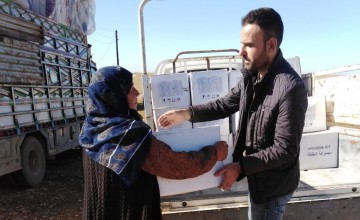 Concern staff distributing hygiene kits in Syria, 2019