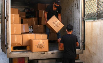 Our local programme partner delivers vital food rations to Syrian families living in informal refugee settlements in Jordan. Photo: Act for Peace/Jordan