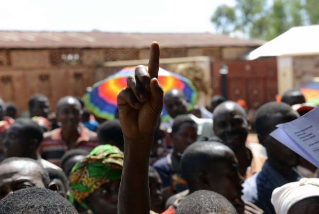 Jean-Marie Mbonimpa (30) has just received news at a public meeting held outside Muhuzu primary school in Busoni that he has been selected to take part in a new phase of Concern’s graduation programme. Photo: Chris de Bode/Panos Pictures for Concern Worldwide